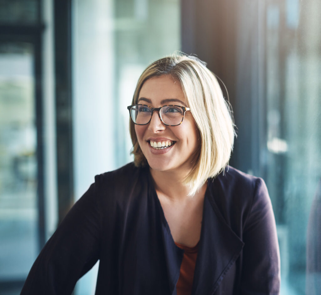Shot of a happy businesswoman in a modern office